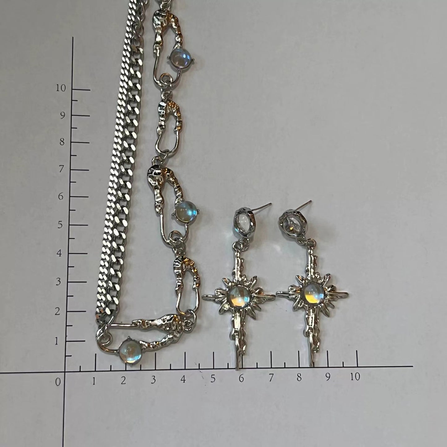 Moonstone starburst niche delicate gradient flow illusion pin necklace