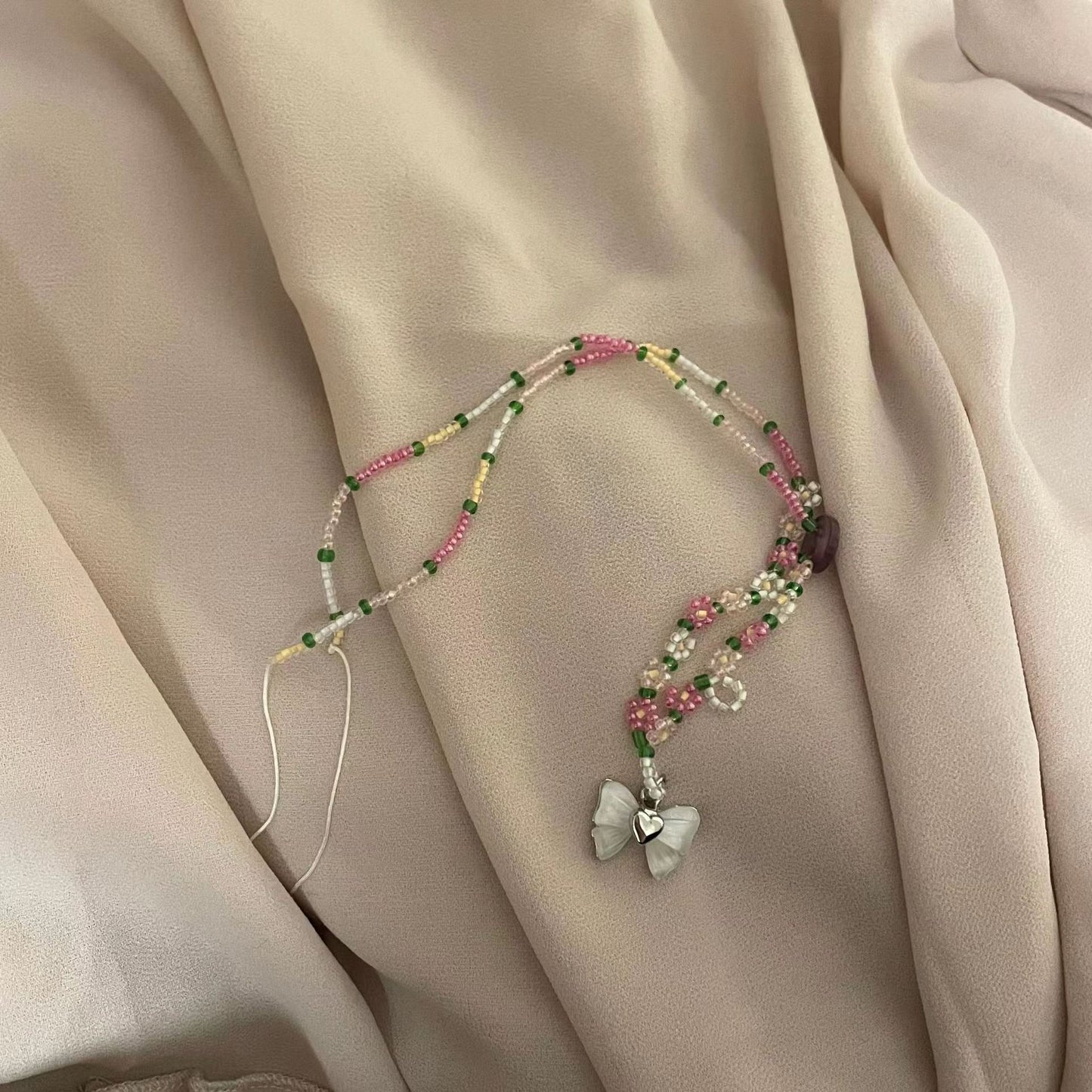 Korean version bow pendant pink flower beaded necklace white bow colored flower collarbone chain bracelet