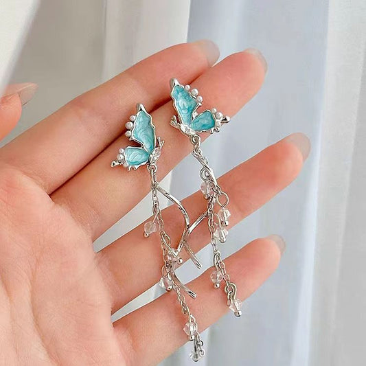 Unique crystal blue butterfly tassel long earrings, luxurious and niche earrings, 2023 new design sense earrings for women