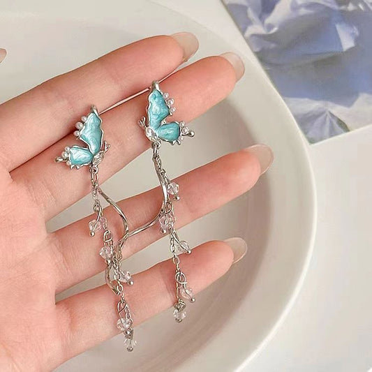 Unique crystal blue butterfly tassel long earrings, luxurious and niche earrings, 2023 new design sense earrings for women