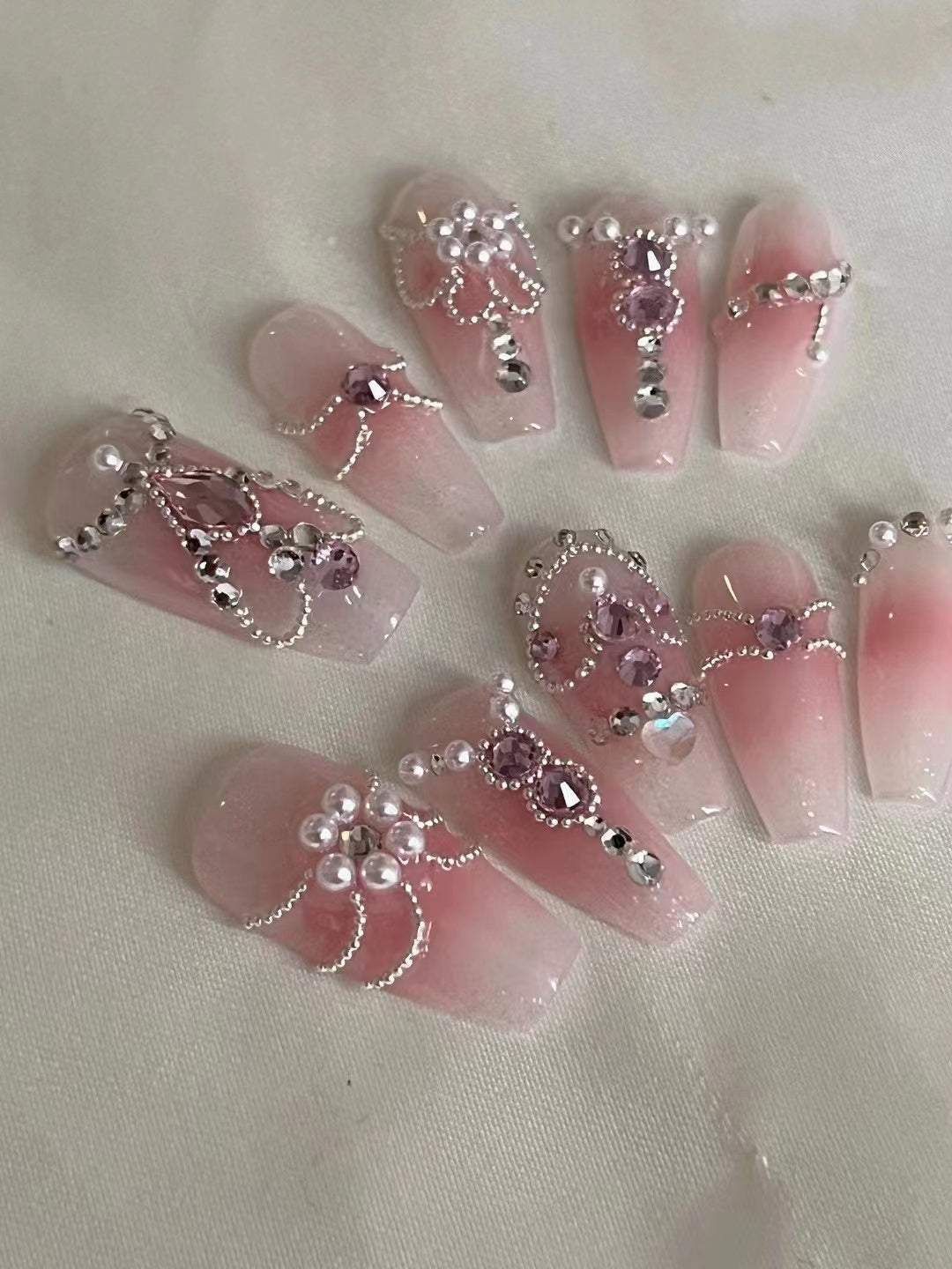 Haute Couture Nails can be privately sent to choose the shape of the nail
