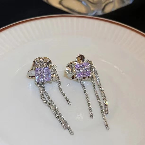 Silver pin ruffled geometric tassel earrings with diamonds