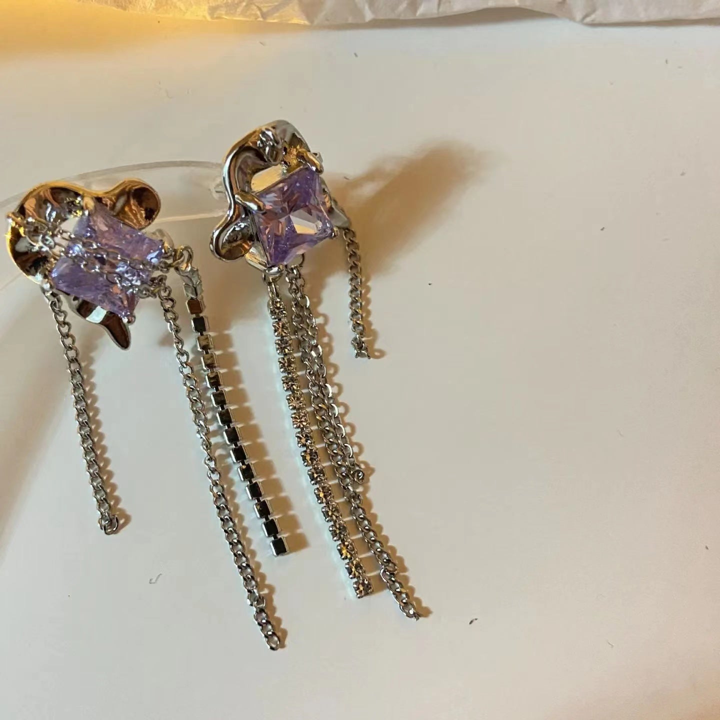 Silver pin ruffled geometric tassel earrings with diamonds