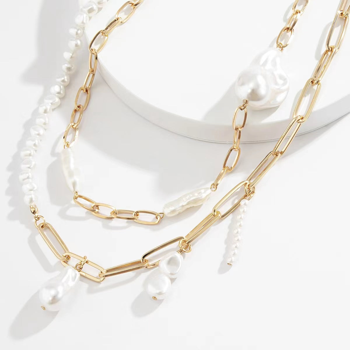 Golden multi-layered pearl necklace