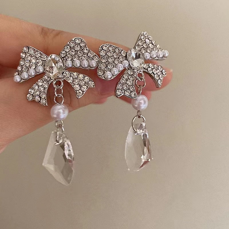Pure desire girl light luxury senior sense zirconia bow earrings French delicate sweet niche pearl new tide