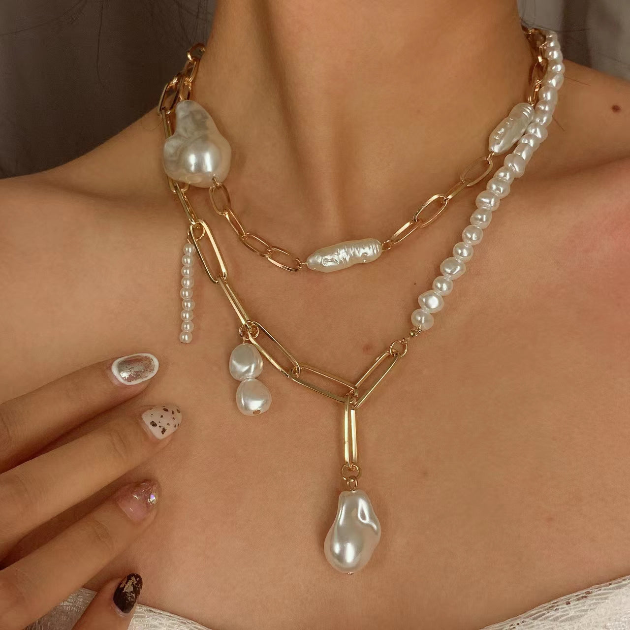 Golden multi-layered pearl necklace