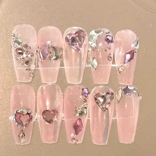 Artificial nails are worn by hand, showing white and pink French flash diamond rose lovers' manicure wedding nails are removable