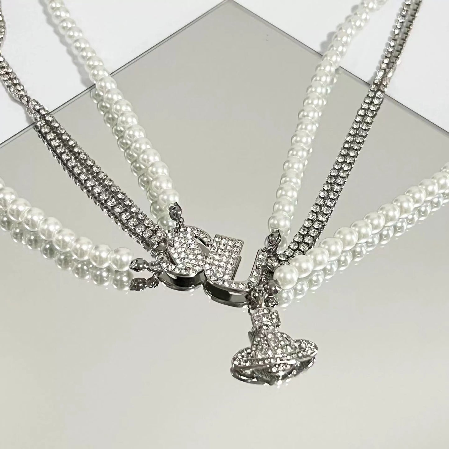 Fashionable multi-layered design sense sparkling diamonds Queen West planet pearl necklace