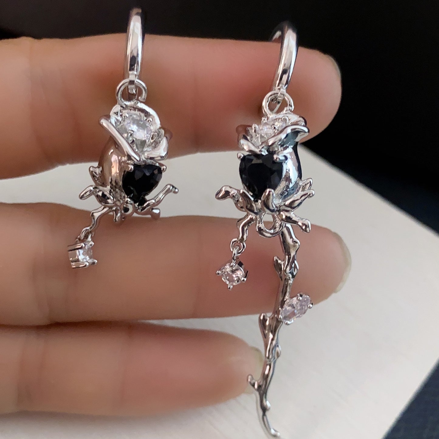 New asymmetric rose studded earrings cool